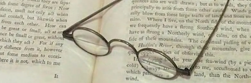 who invented bifocal eyeglasses